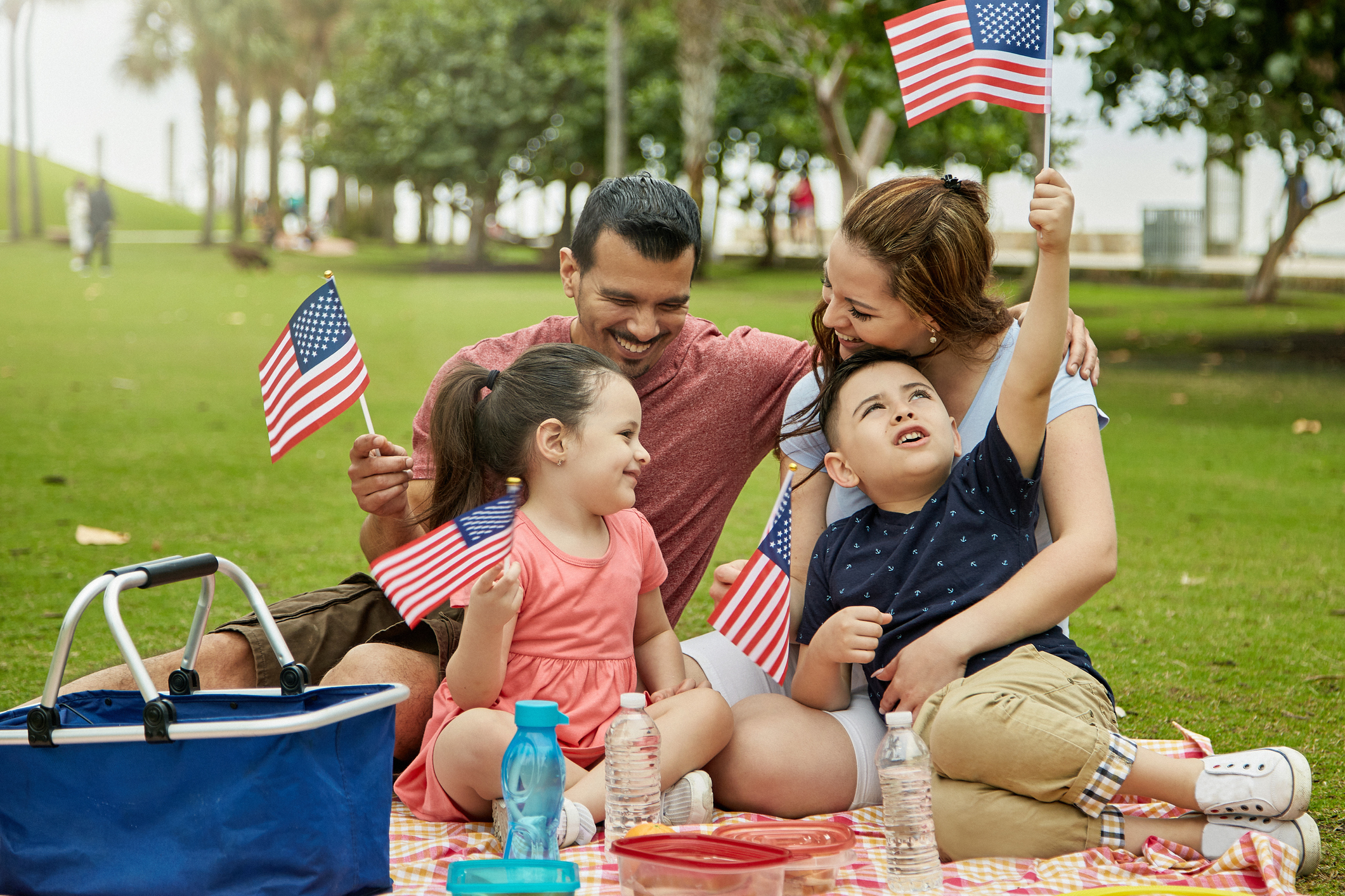 Patriotic Hispanic Family Picnicking at Miami Public Park